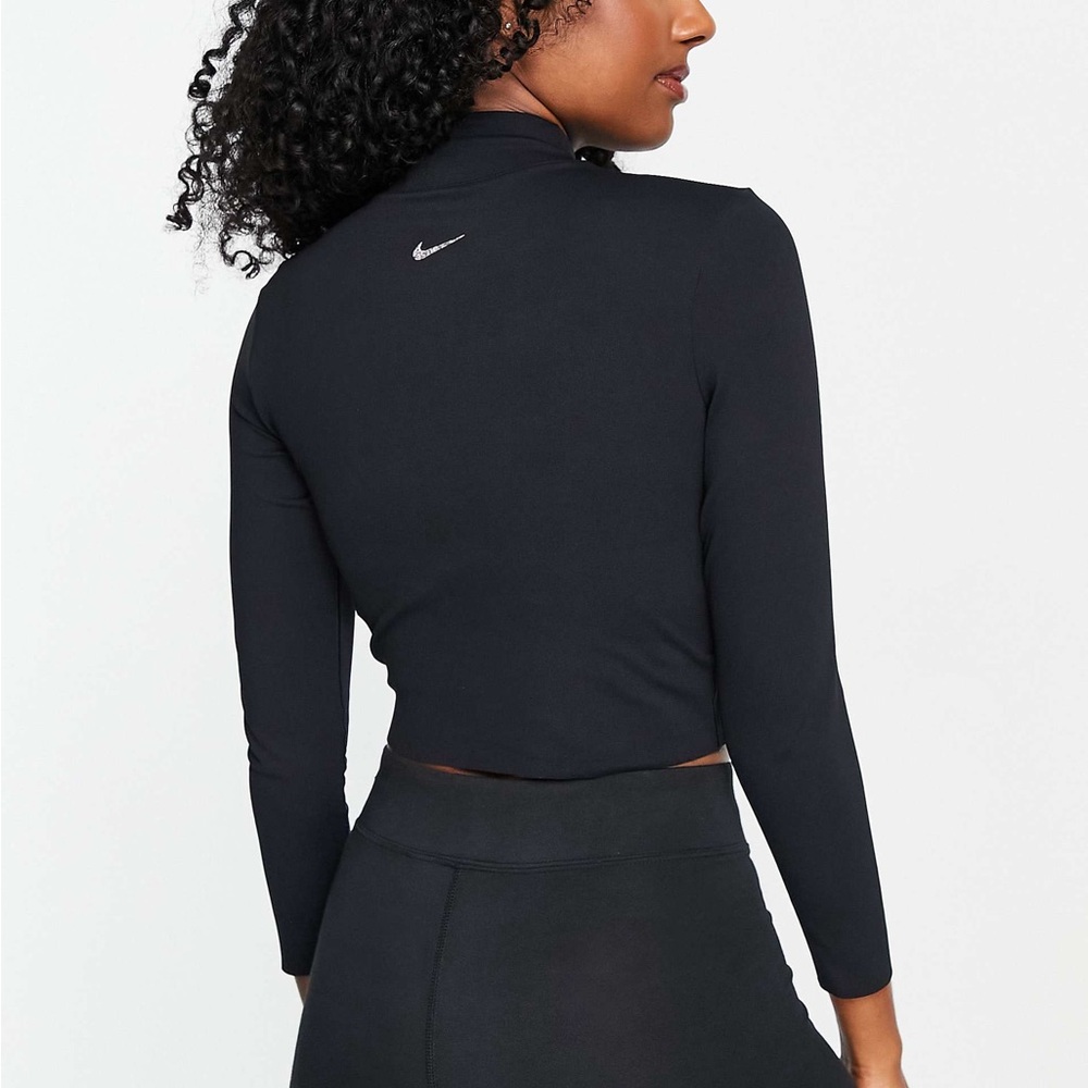 Nike Women's Yoga Luxe Dri-FIT Luxe Long Sleeve Crop Top in black size medium